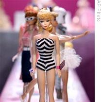 The first Barbie doll wore a black and white swimsuit