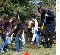 First lady Michelle Obama takes part in the groundbreaking of the White House Kitchen Garden with the help of students from a local school in Washington D.C. earlier this month.