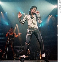 In this 13 Nove 1988, file photo, pop singer Michael Jackson performs before a sold out crowd for his Bad tour at the Los Angeles Sports Arena