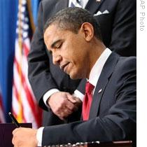 President Obama signing the $787 billion federal stimulus bill into law on February 17