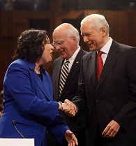 Judge Sonia Sotomayor is greeted on Capitol Hill by Sen. Orrin Hatch, right, and Committee Chairman Sen. Patrick Leahy, at center, 13 Jul 2009