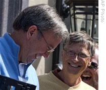 Google CEO Eric Schmidt, left, and Microsoft Chairman Bill Gates laughing together at a media conference in Idaho earlier this month