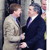 British PM Gordon Brown, R.I. Dem. Rep. Patrick Kennedy shake hands on Capitol Hill, 04 March 2009, after Brown announced Kennedy's father, Sen. Ted Kennedy, will receive honorary knighthood