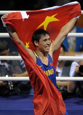 Zhang Xiaoping of China celebrates after defeating Kenny Egan of Ireland at the mens light heavy (81kg) final bout at Beijing 2008 Olympic Games boxing event at Workers Gymnasium in Beijing, China, Aug. 24, 2008. Zhang Xiaoping won the gold medal of the event. (Xinhua Photo)